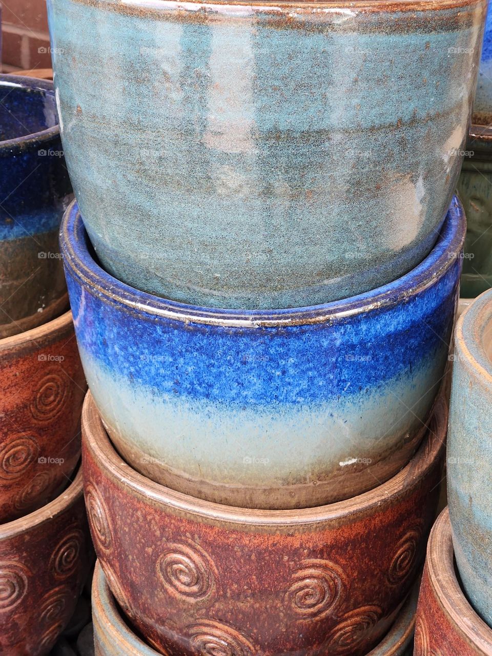 colorful stack of planter pots for gardening