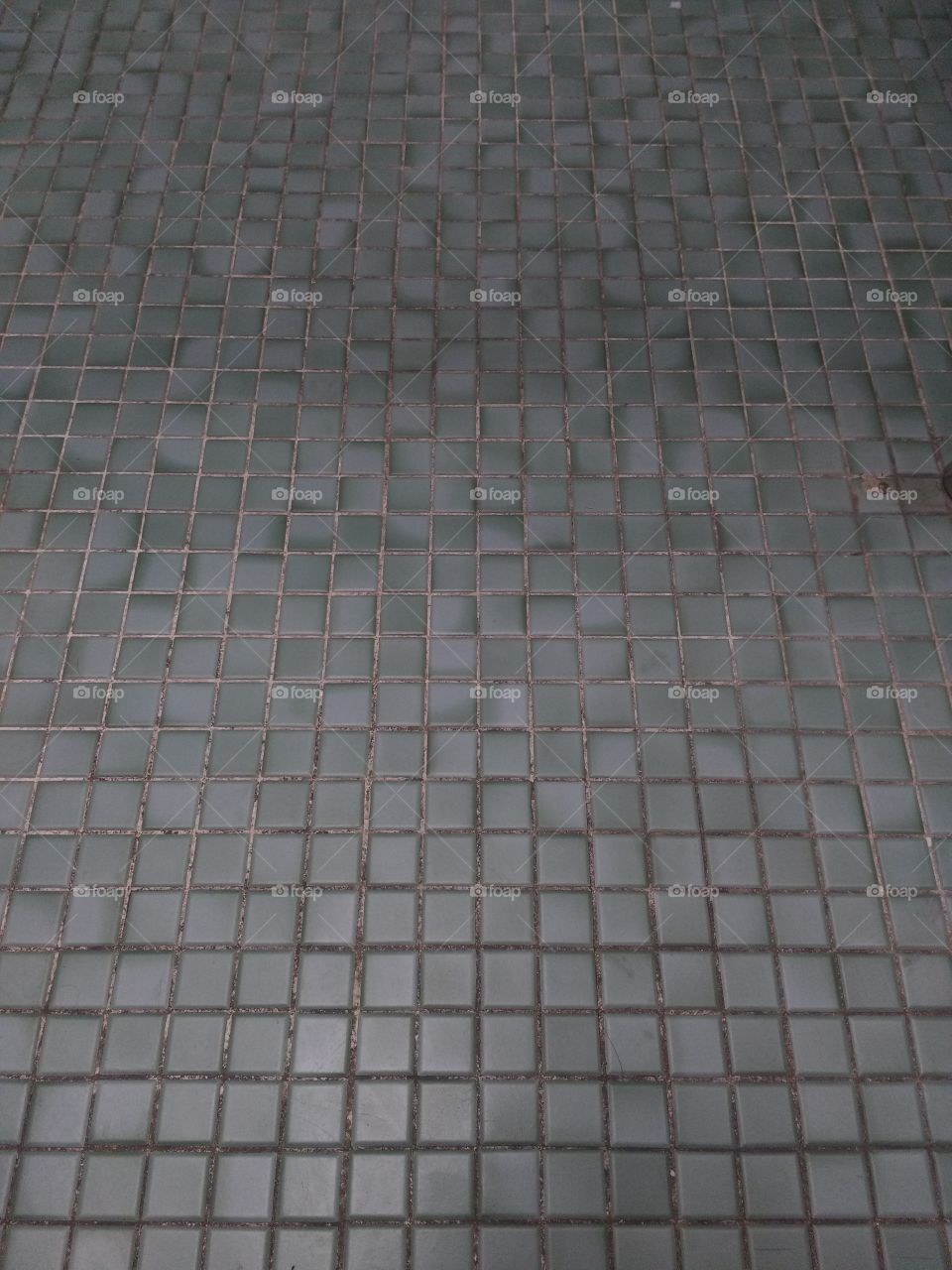 green tile flooring.