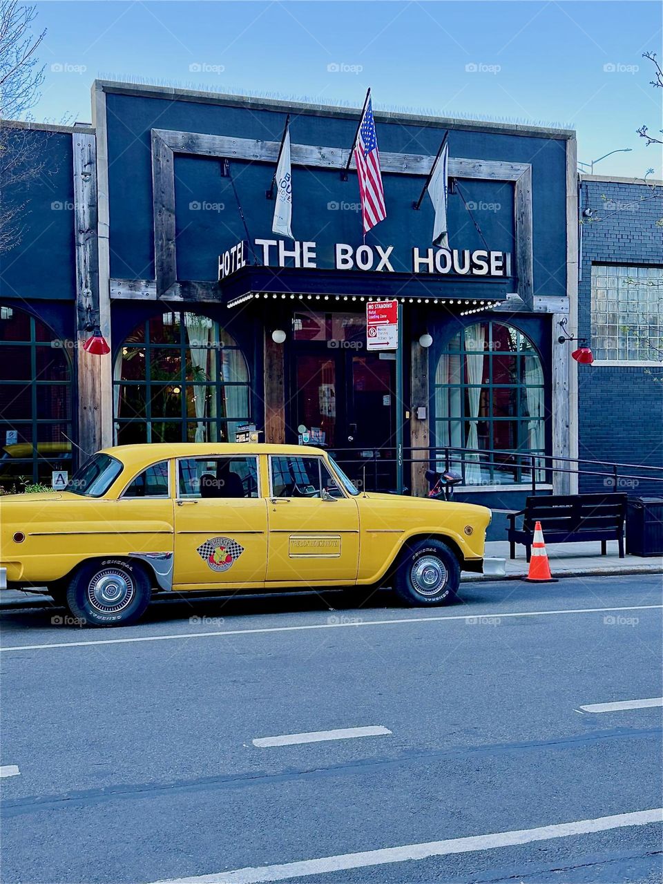 This is the “BOX HOUSE HOTEL”, a popular boutique hotel on “Box Street” in “Greenpoint”, Brooklyn near the “Pulaski Bridge” at “Newtown Creek”. There is always at least one yellow cab parked in front of the lobby. 2024. Hypnotic Productions