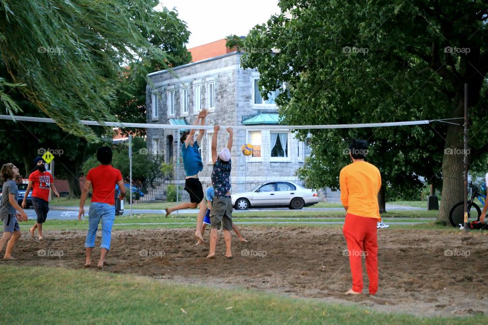 Playing volleyball