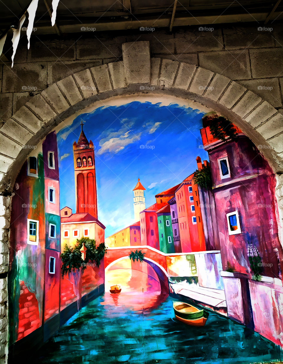 Graffiti.  Colorful houses and water channel