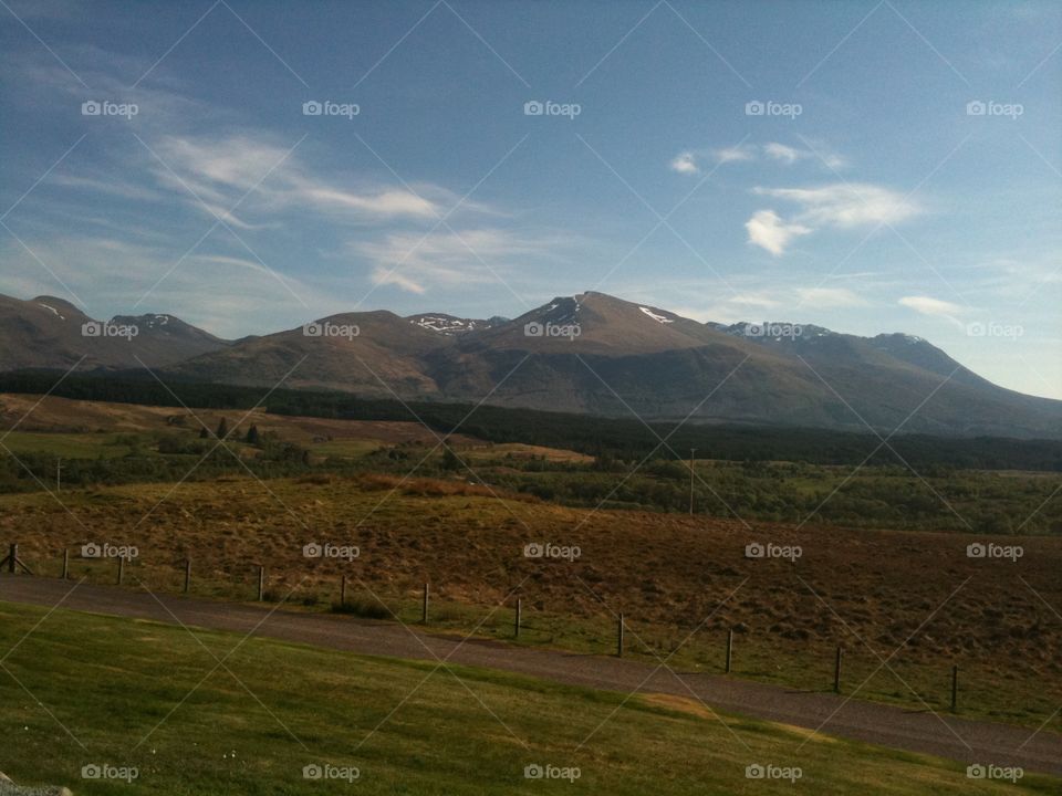 Some of the snow capped mountains of Scotland, on a clear cold day. Hardly a breath of wind and no rain. 