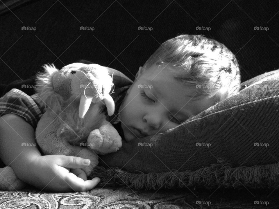 Snoozin with his tiger 