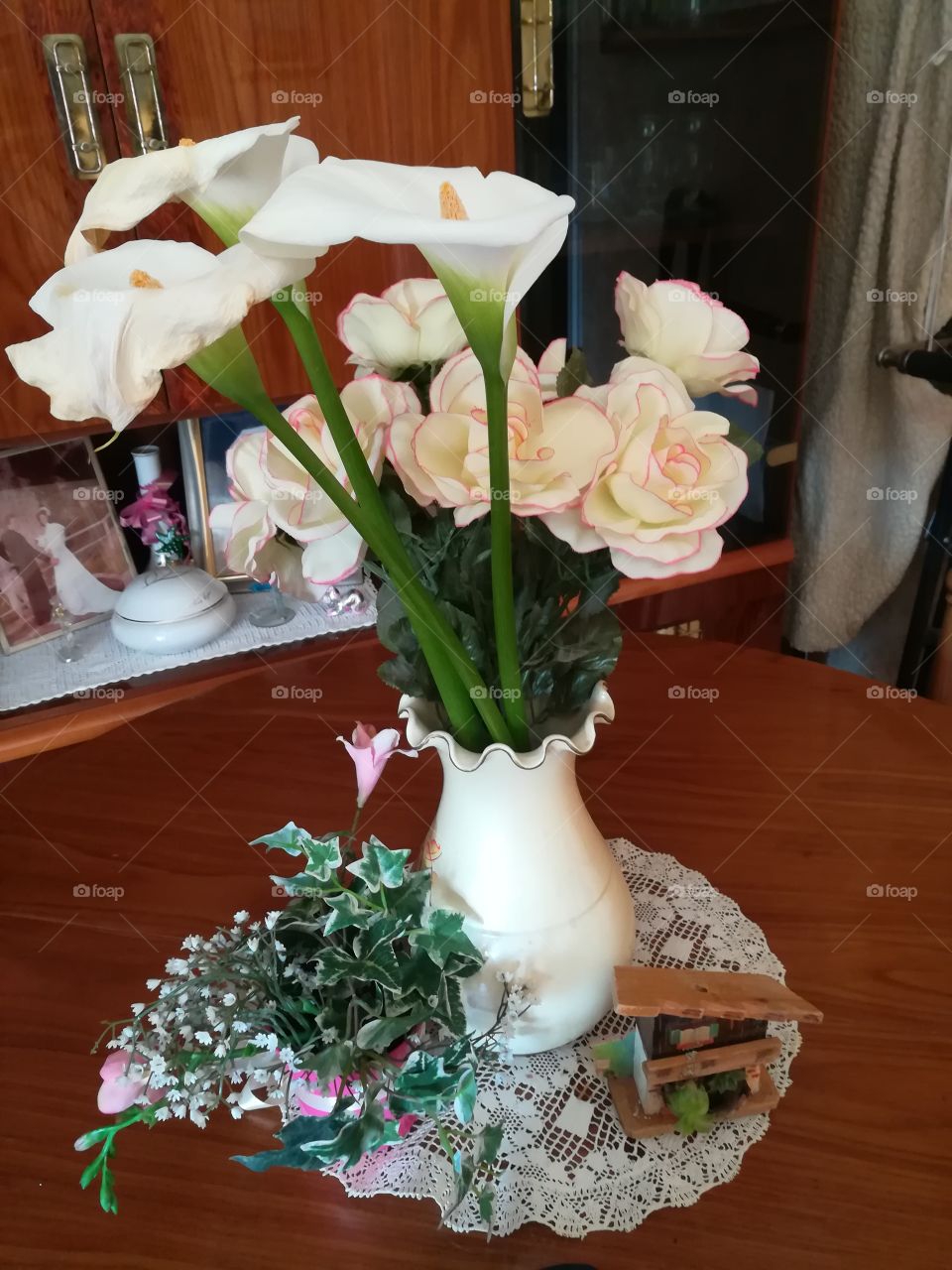 vintage apartment, vase of flowers and ornaments