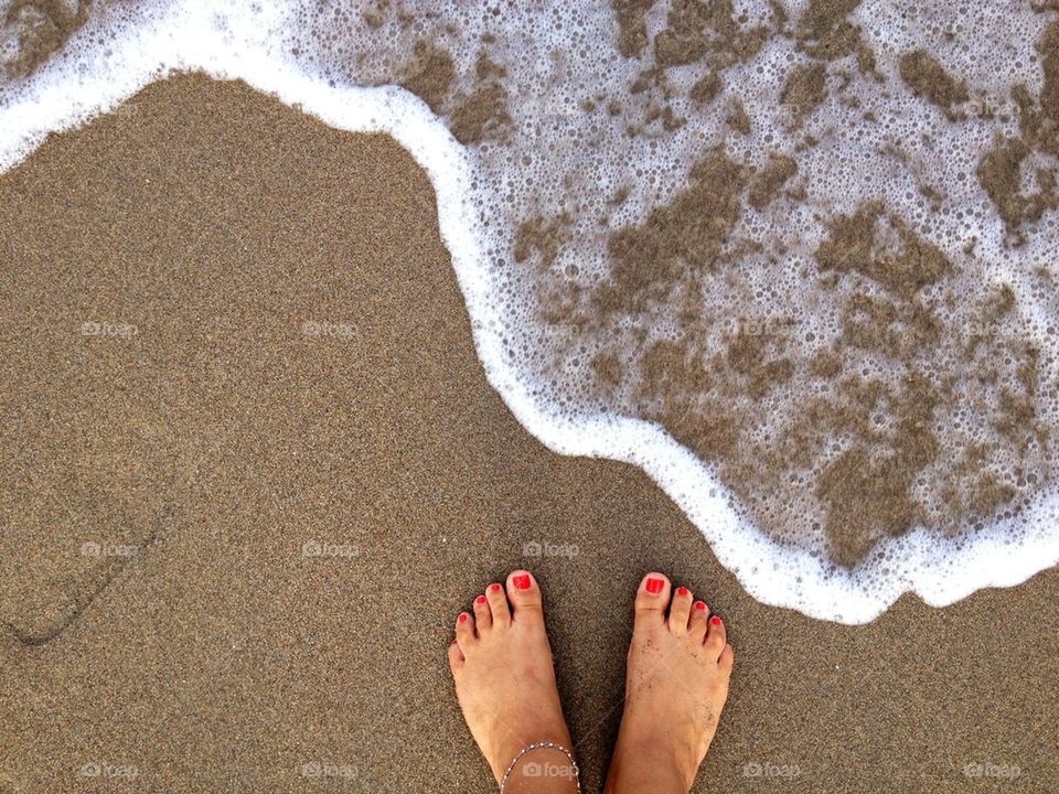 At the edge of the ocean