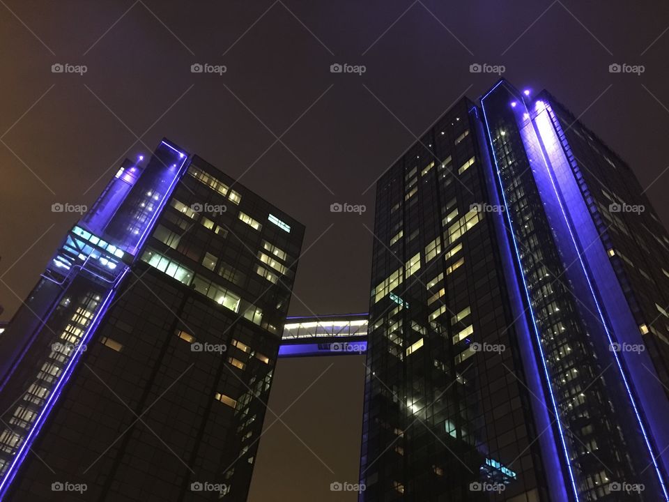 Gothia towers at night from bottom with neon lights in Liseberg, Sweden.