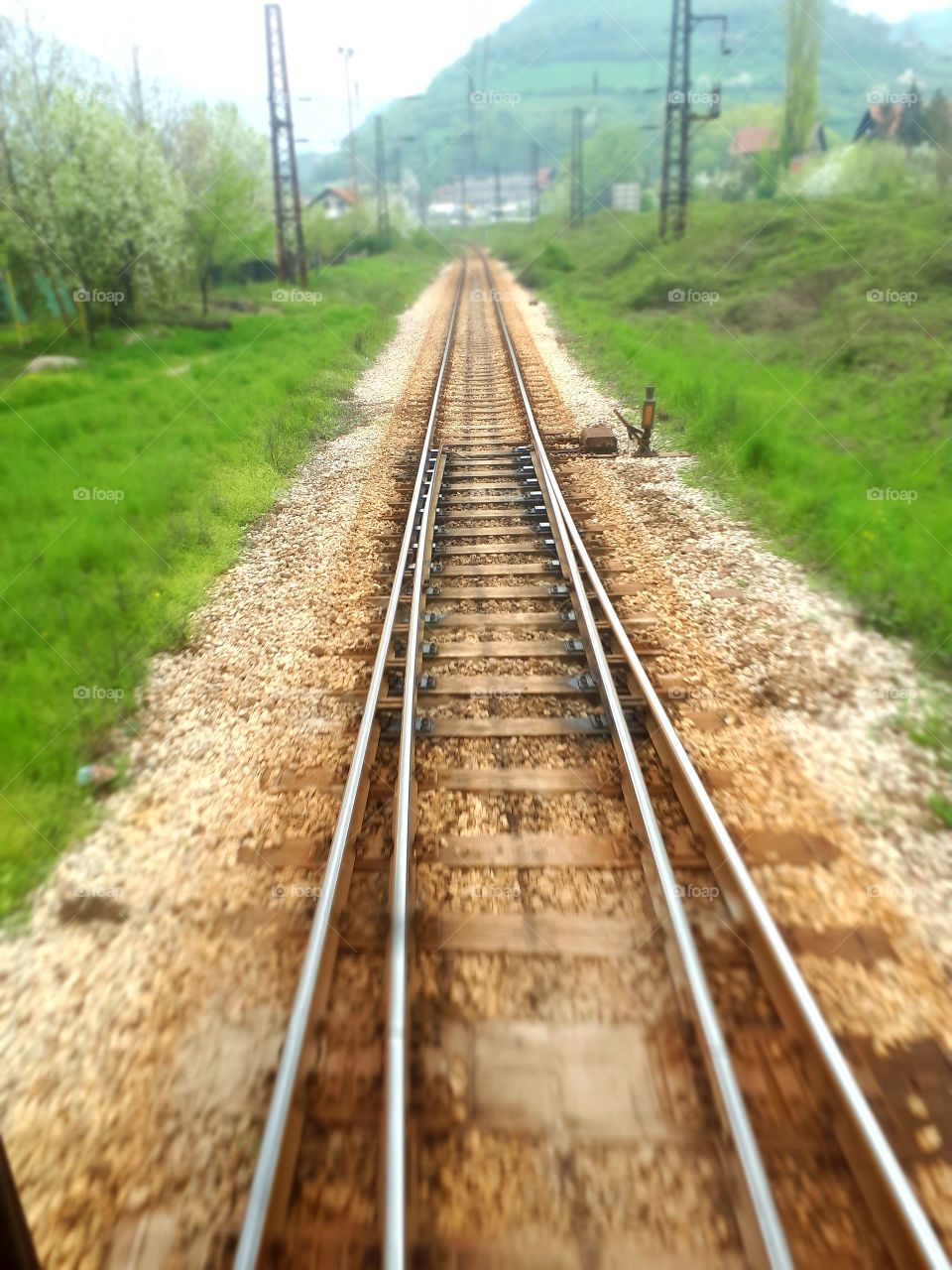 A view from the window of the last passenger wagon to the railroad and the place where the junctions are connected