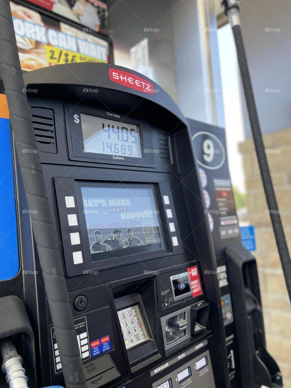 Sheetz gas station, filling up the gas tank, getting gas in a SUV, new gas station in town 