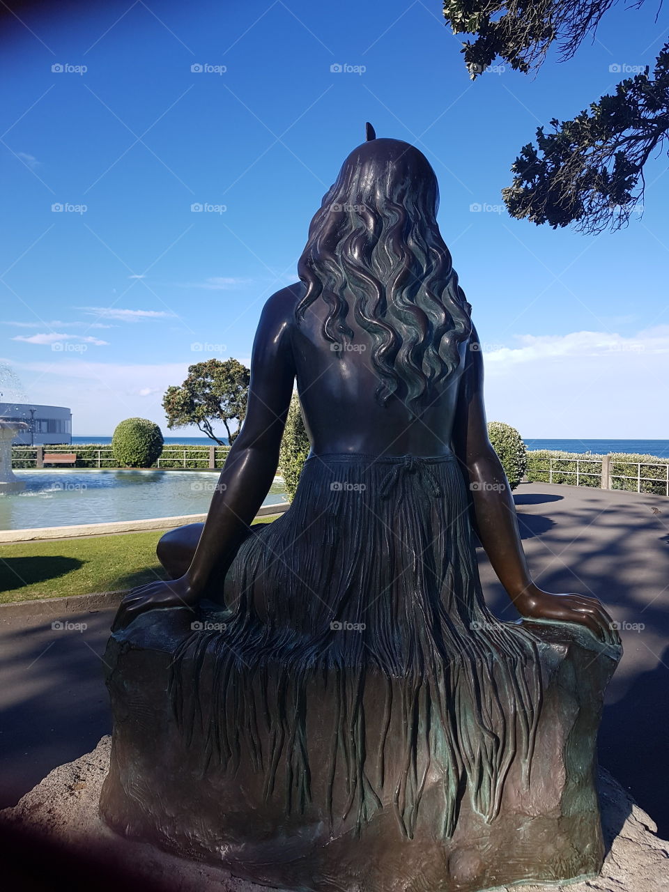 Pania of the reef. A Maori legend of a woman(Google to learn about the story of Pania) Napier. New Zealand. She now sits as a bronze sculpture looking out into the bay. Thieves once stole the sculpture but she was recovered and placed back here again