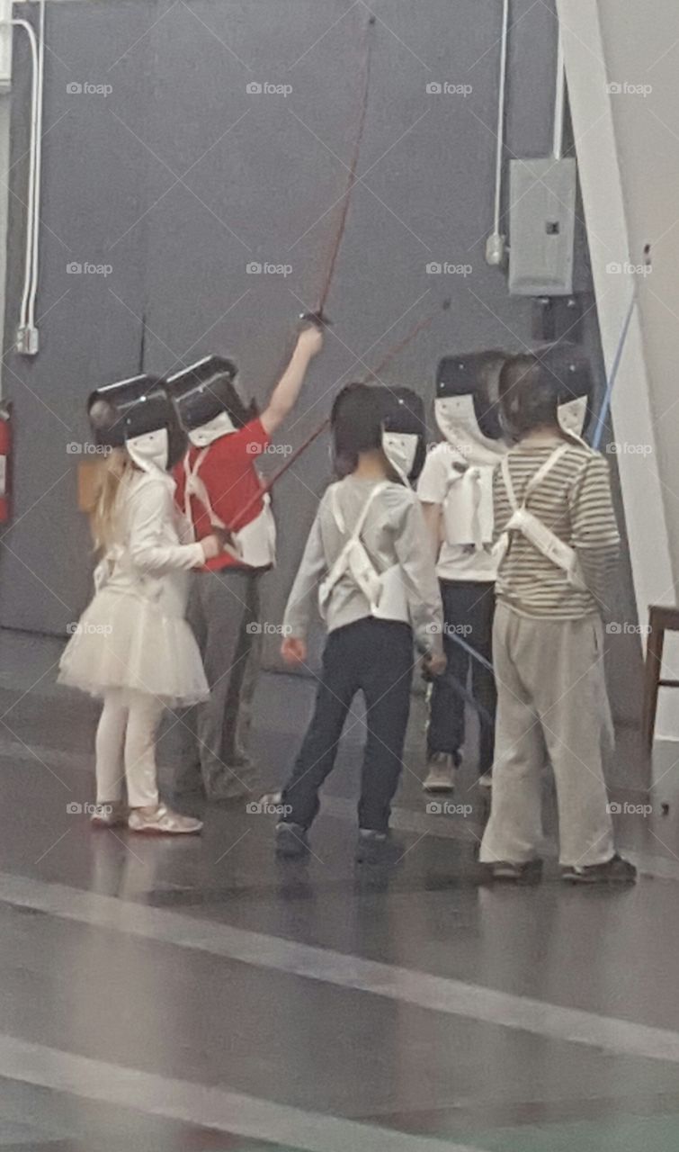 Children in Fencing Class
