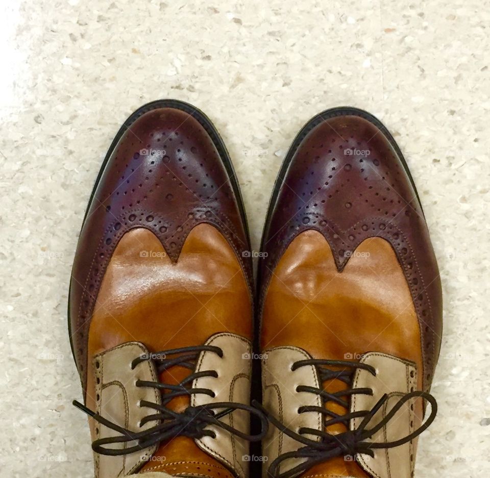 Three-tone, hand-made, Italian leather shoes.