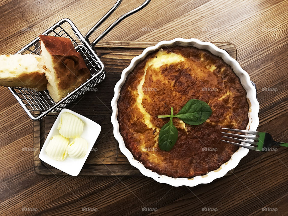 Homemade omelette with toasts and butter for breakfast 