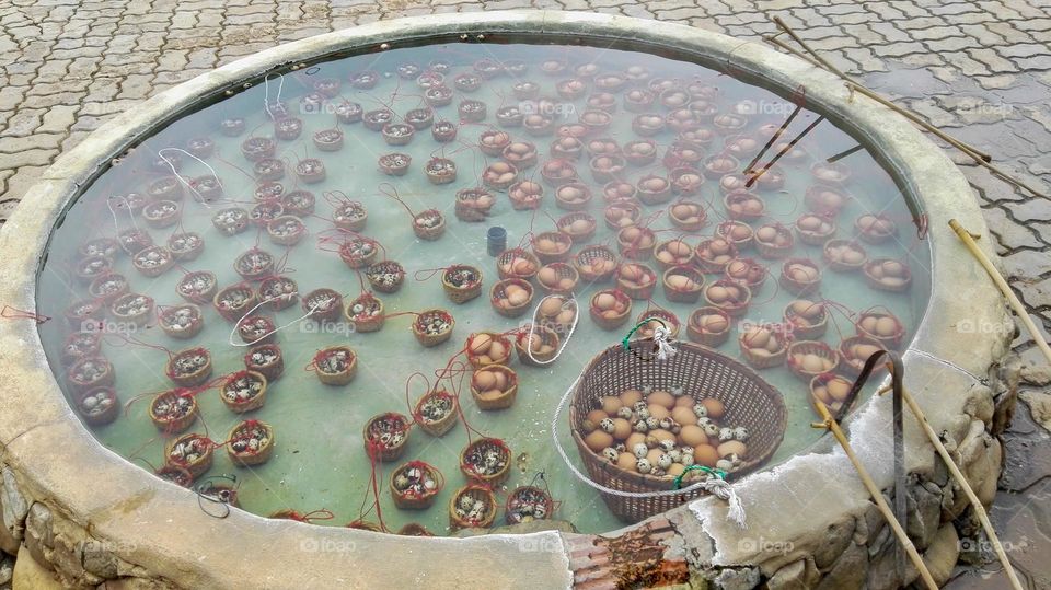 Basket eggs cooked in a natural hot water 