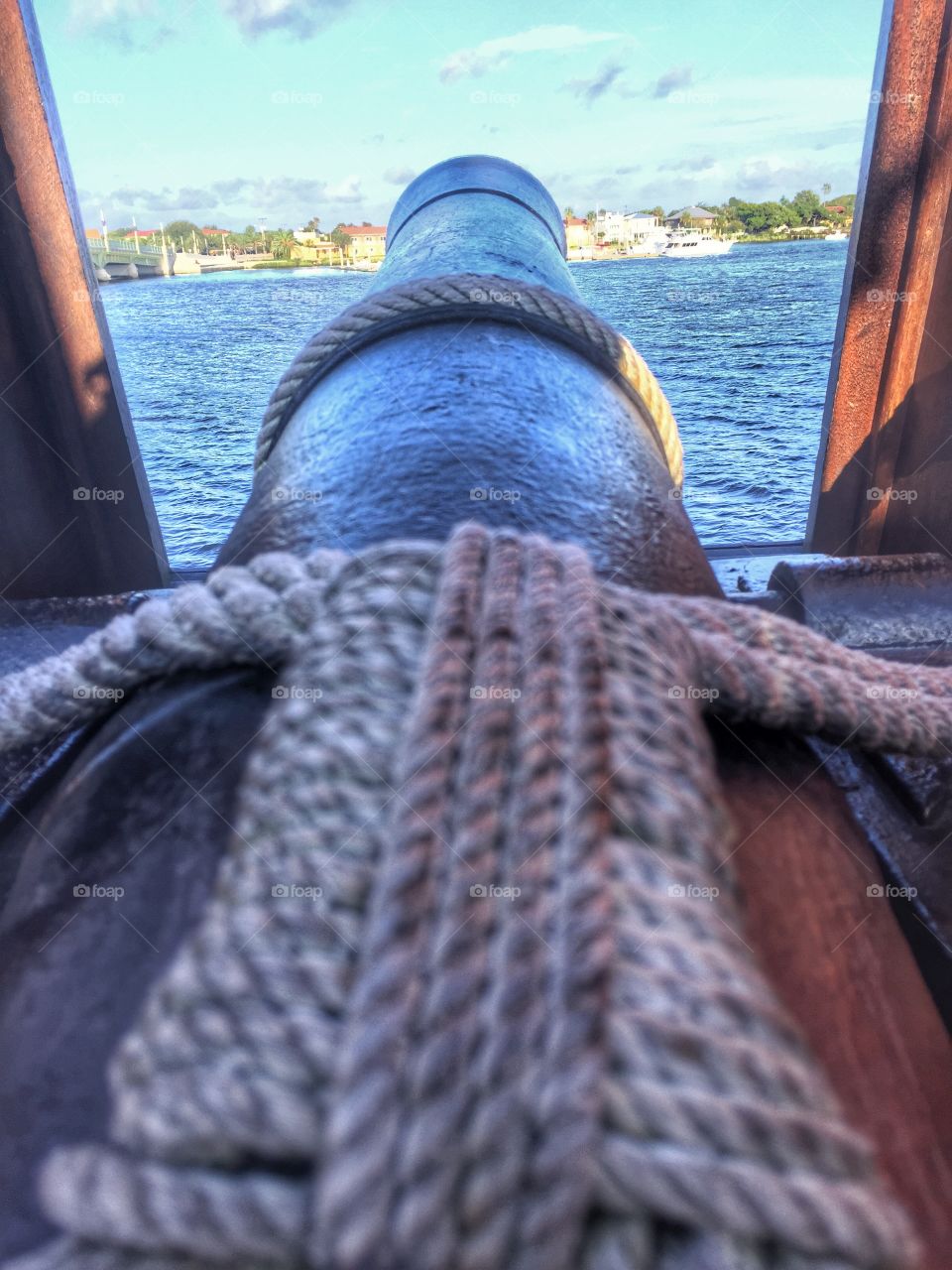 Out of the water. A cannon overlooking the water 