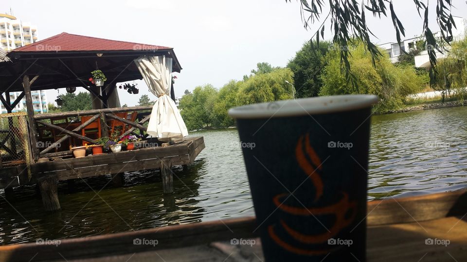A great coffee can make your day. This is a lovely morning on the lake, the wind is blowing softly so the lake has light waves. The atmosphere is relaxing and chiling your thoughts