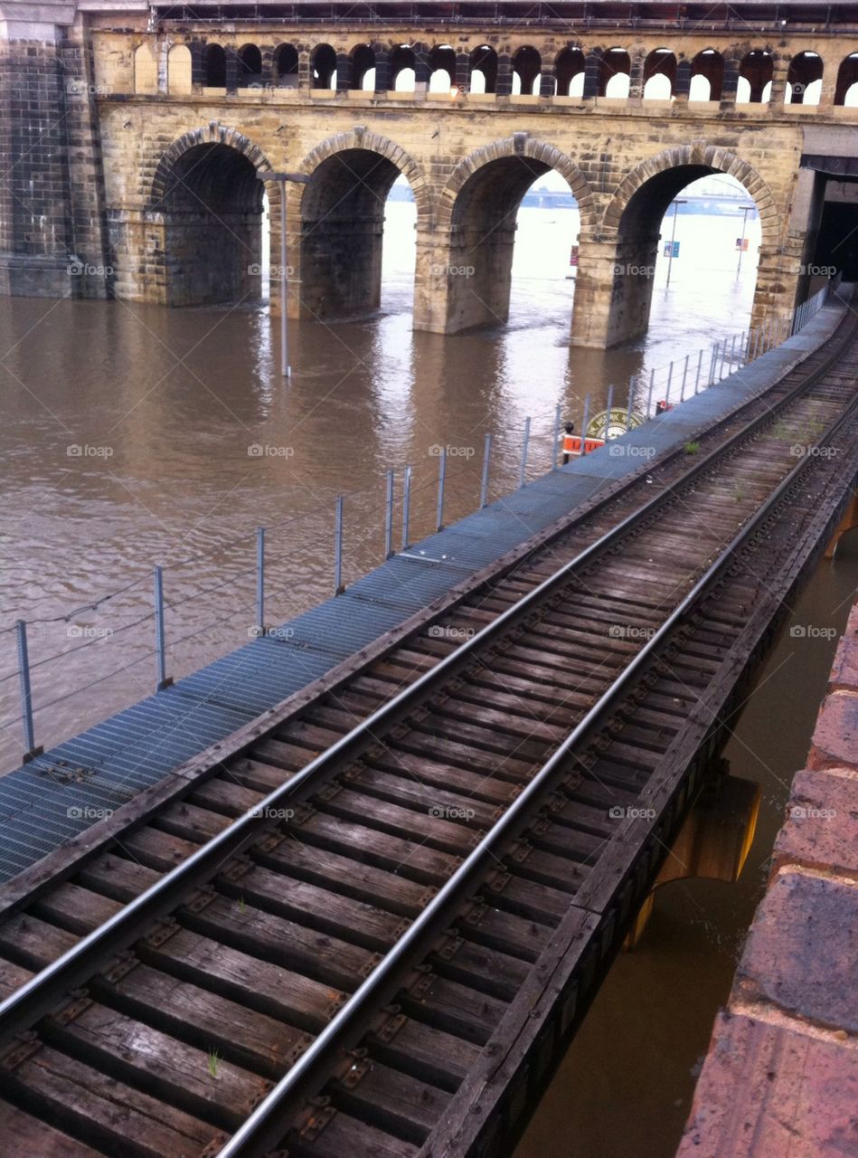 Flooded rails ways. Flooding in down town saint louis