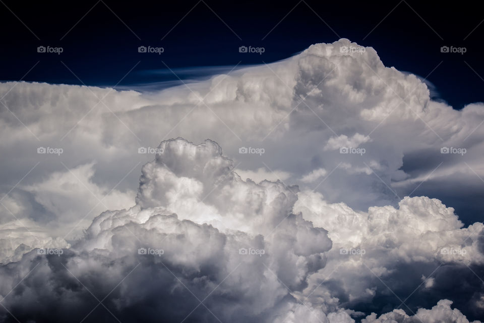 Aerial view of building cumulus clouds. 