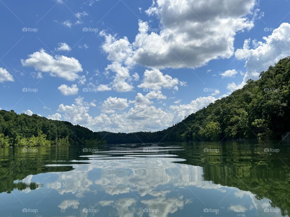 A beautiful relaxing summer morning out on the lake surrounded by the Appalachian Mountains in Kentucky 