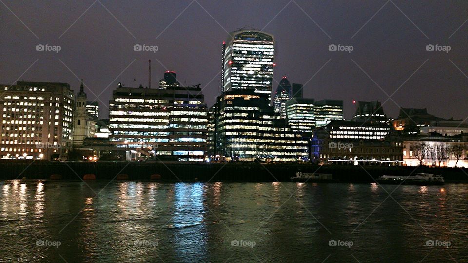 Night on Thames. View of the river Thames in London at night