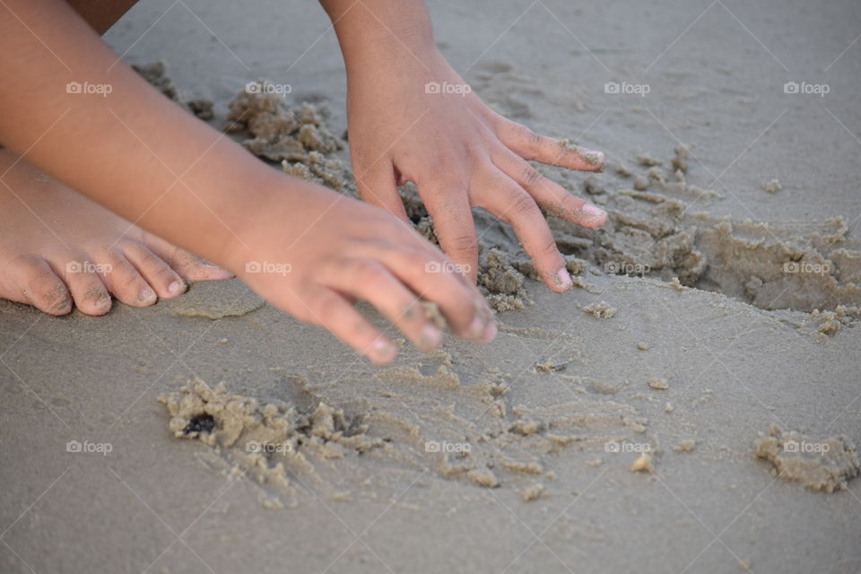 playing in the sand