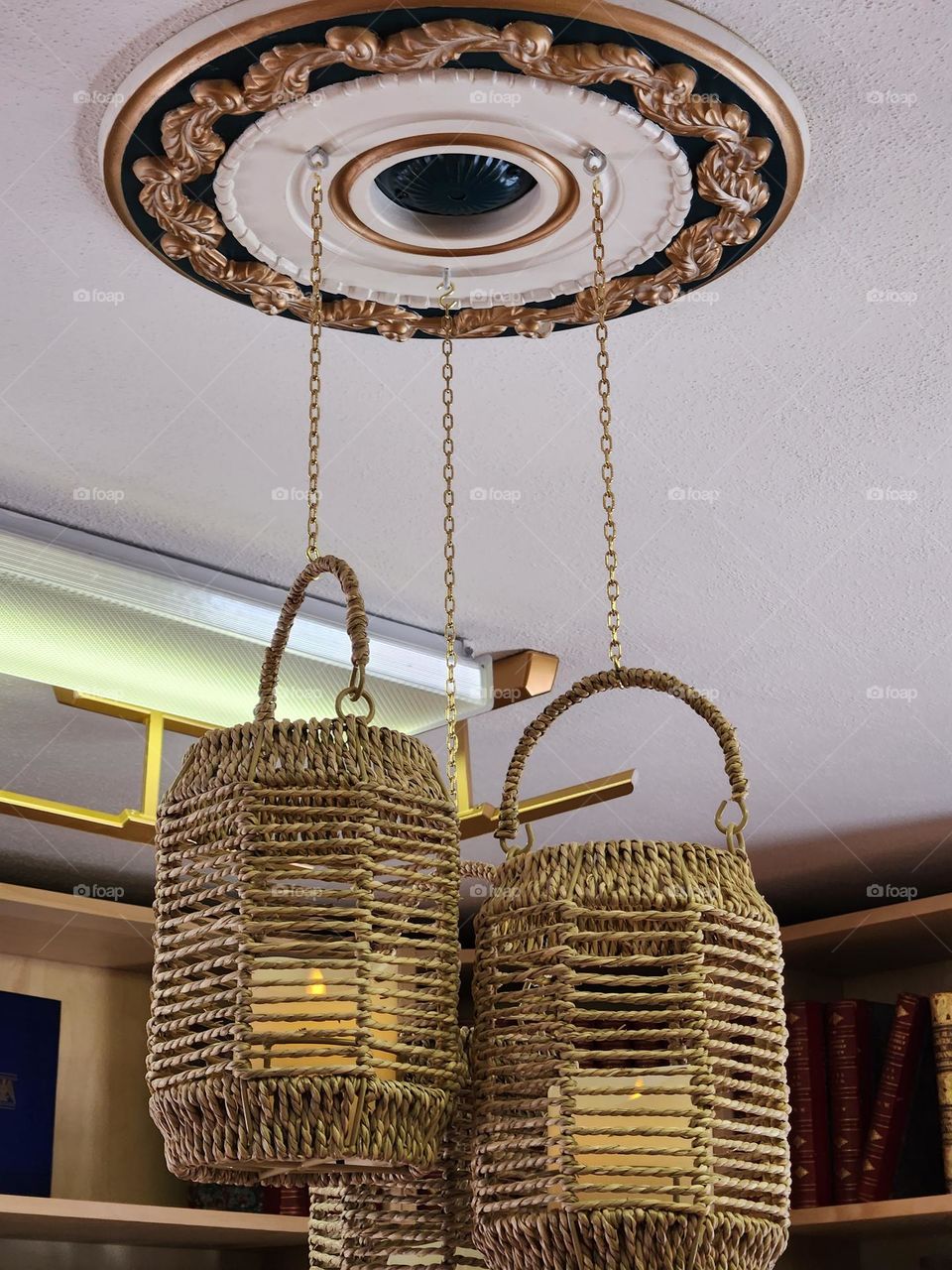 basket lights hanging from ornate ceiling circle design