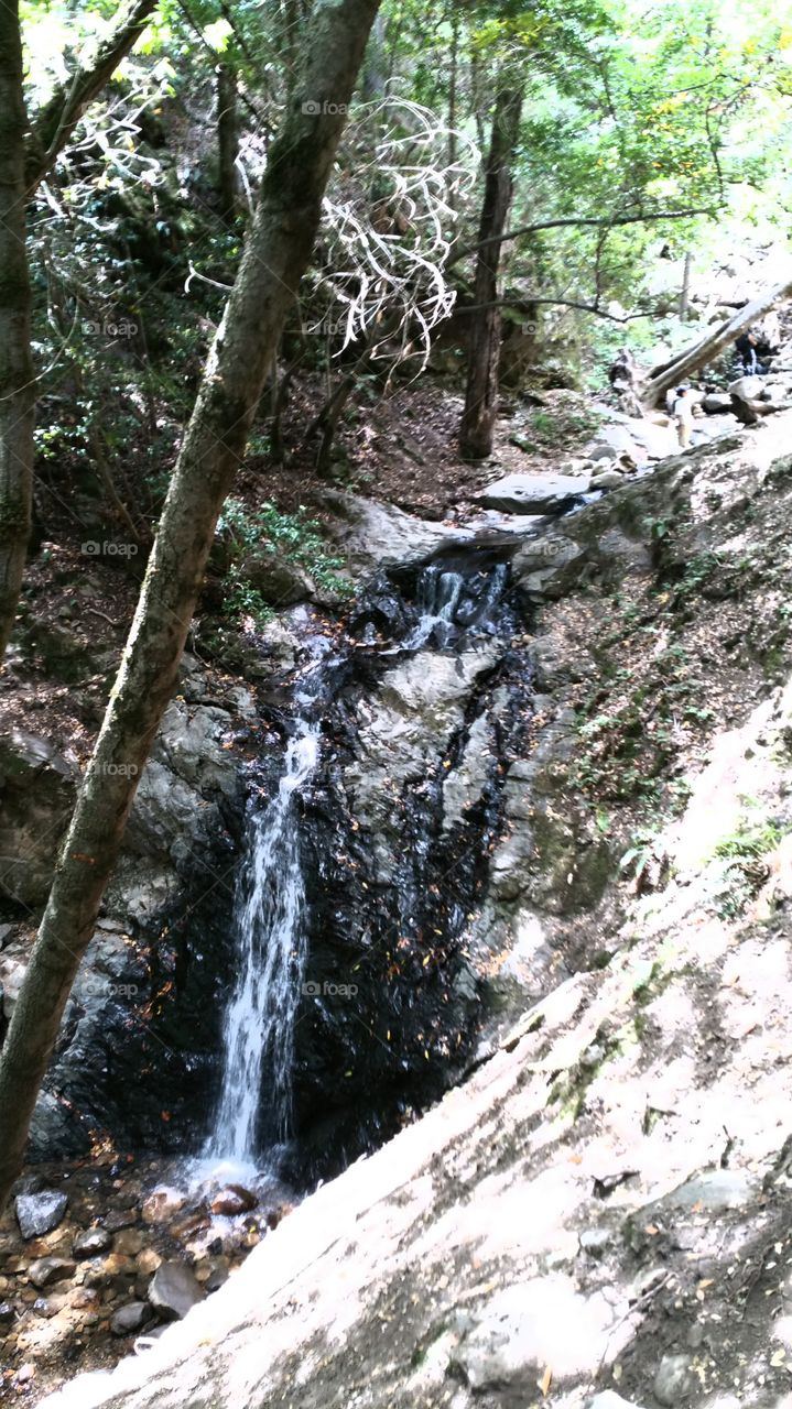 enjoying the waterfall