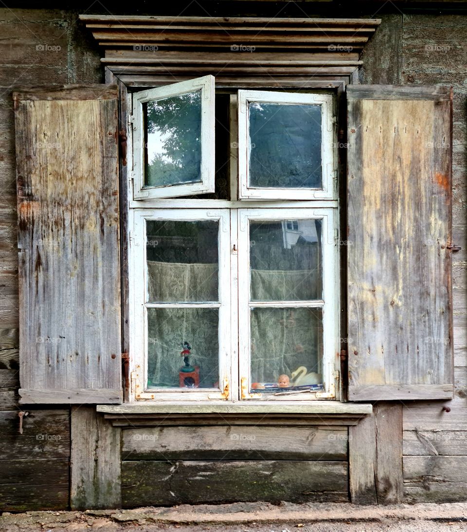 wooden window in an old house with a romantic mood