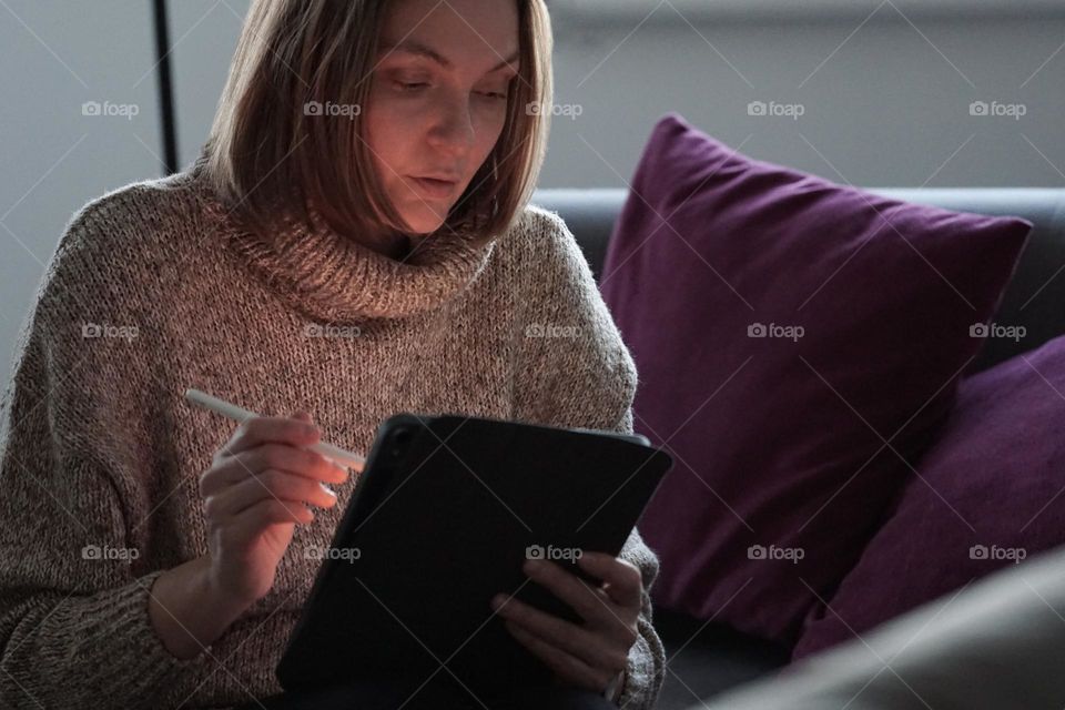 A woman with a tablet 