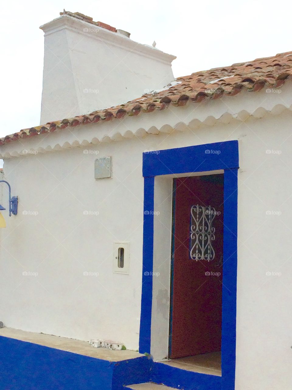 Red front door at Monte das Hortas, Portugal 