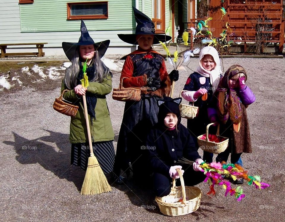 Palm sunday tradition in Finland - children dress up like easter witches or black cats and go around wishing another person health and by tapping them lightly with a willow twig and chanting a rhyme. They get usually revarded with candy or coins.