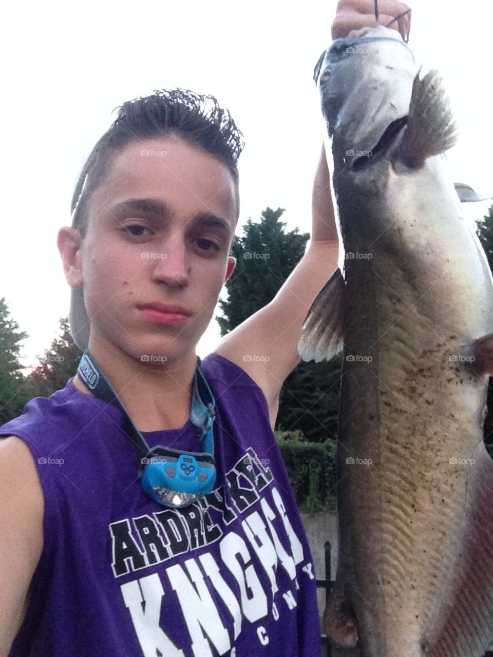 Cat fishing at the pond 