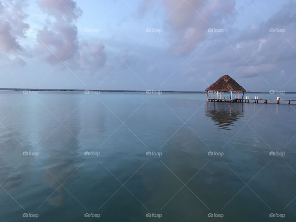 Beautiful tropical lagoon with pier in Bacalar, Mexico