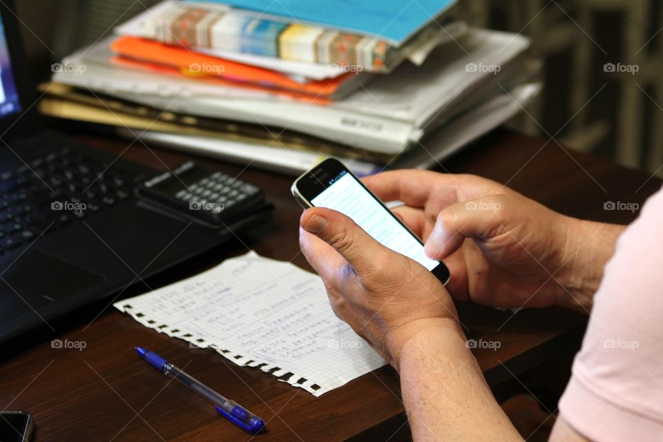 Using mobile phone and laptop