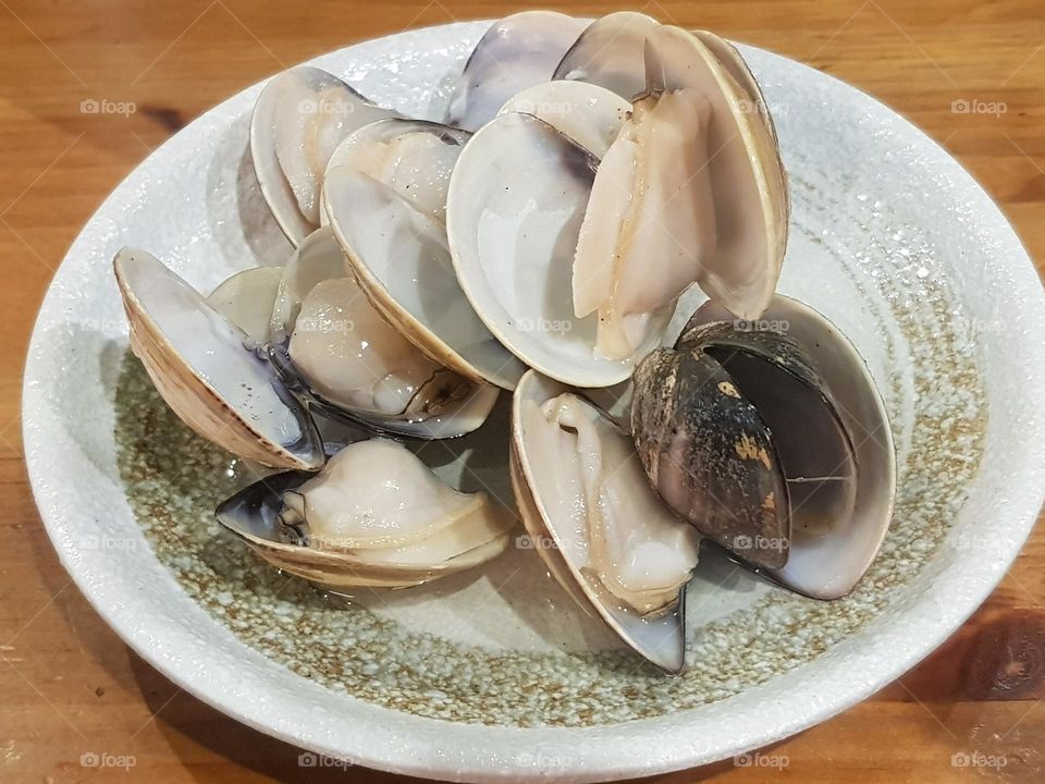 Delicious sea food boiled mussels dishes