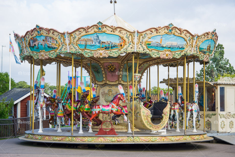 carrousel at a funfair at Halmstad adventure land in Sweden.