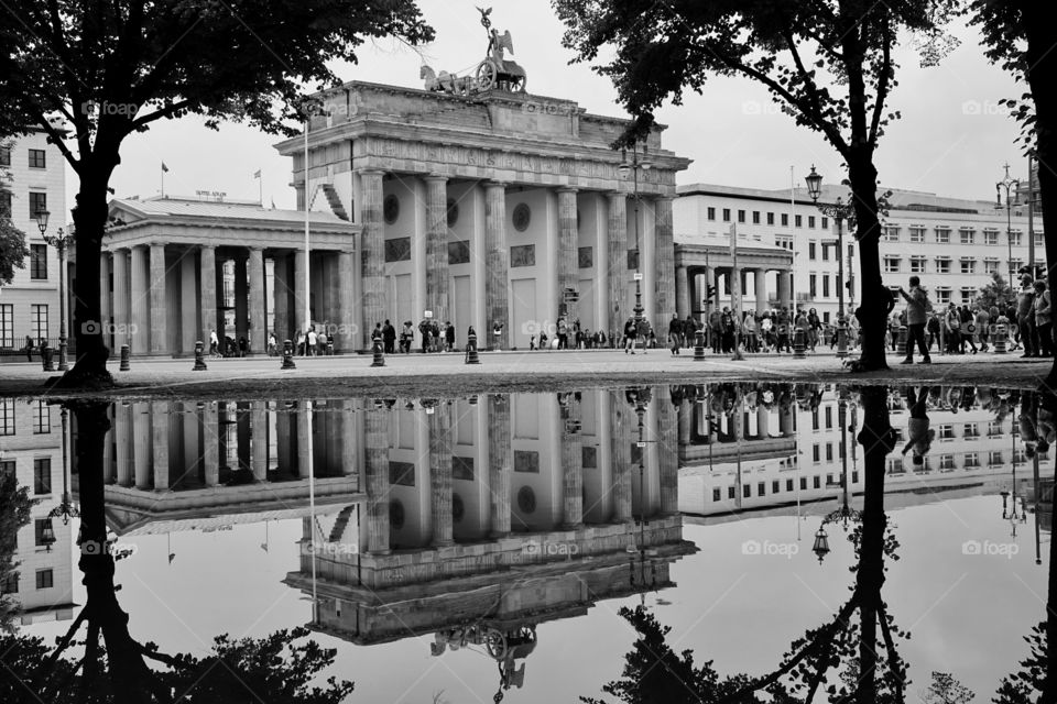 Composition Mission .. . Frame the subject .. photo taken in Berlin after heavy rainfall left a large puddle in the park opposite The Brandenburg Gate