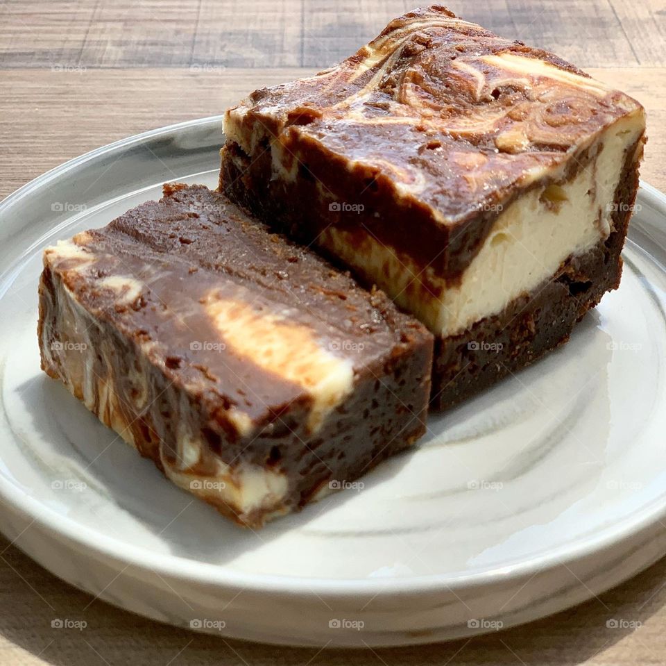 Assorted desserts in cake popsicles, strawberry shortcakes and cheesecake brownies 