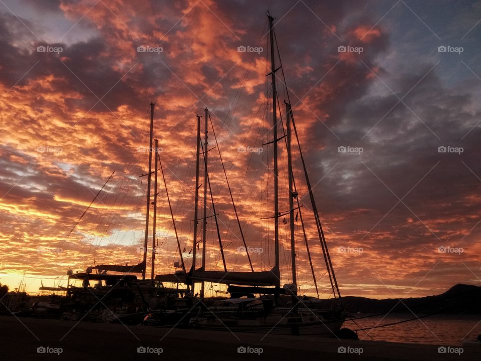 Corfu-Greece. Sailing boats in Mediterranean sunset
