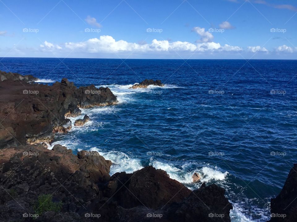 Blue skies, waves, and lava