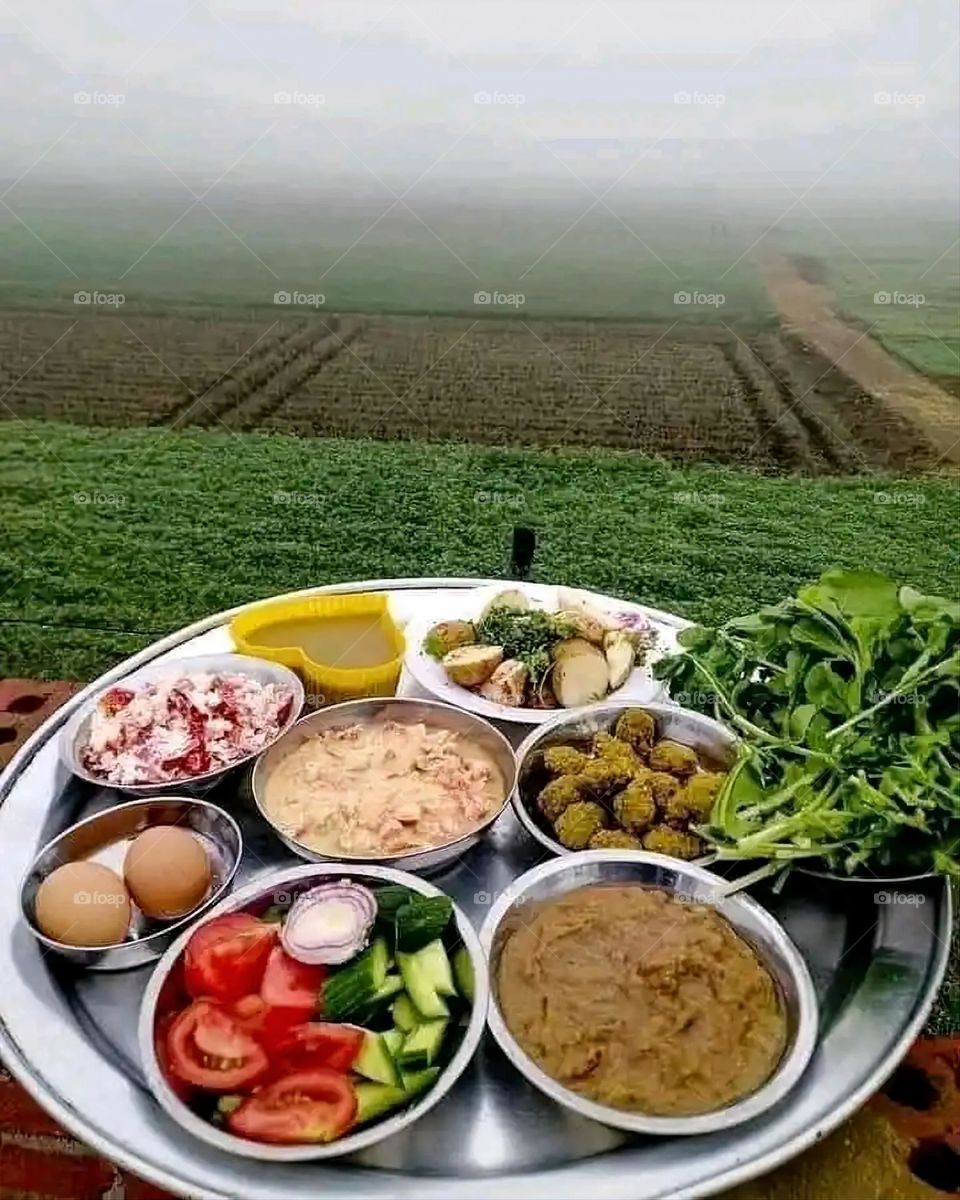 Glory be to God, the magnificent and picturesque view and the natural green trees are a view that is nothing more wonderful than it