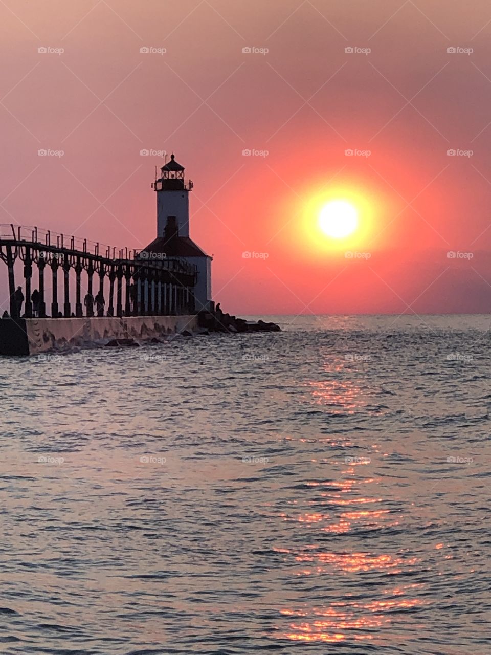 Lighthouse At Sunset