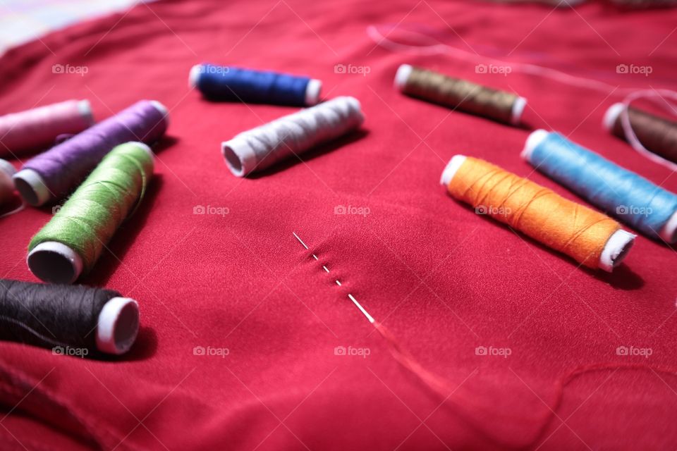 High angle view of colorful threads