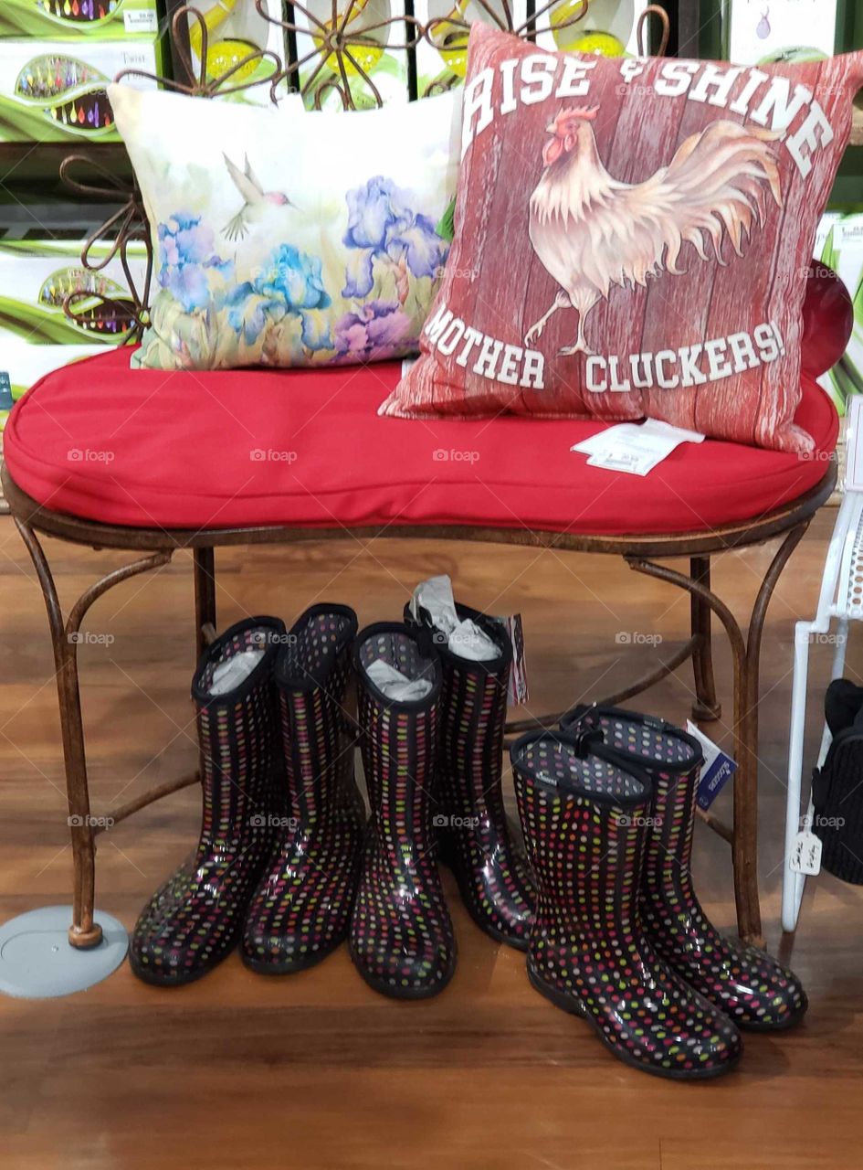 rain boots under a bench