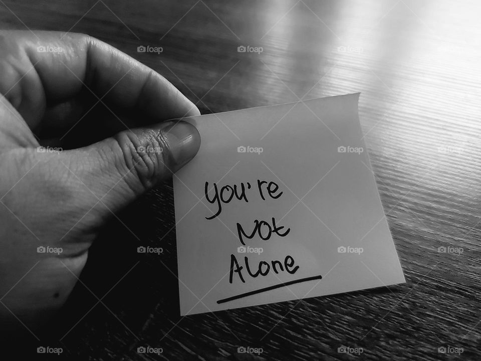 Motivational quotes on a small piece of paper