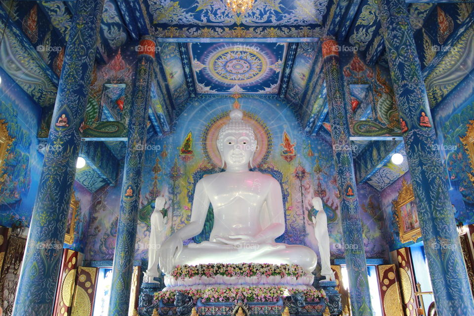 Buddha statue in blue temple
