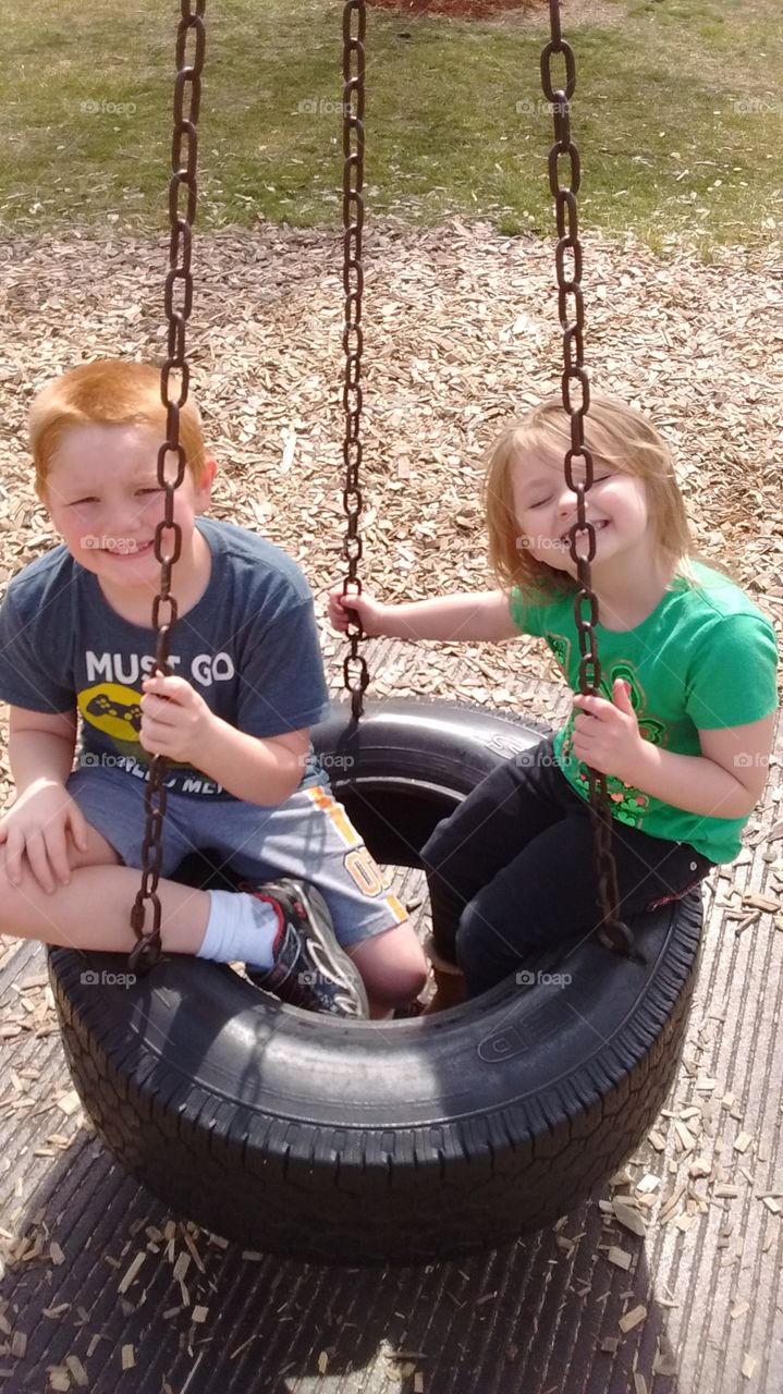 My son Conner and daughter Harley on the Tire Swing.