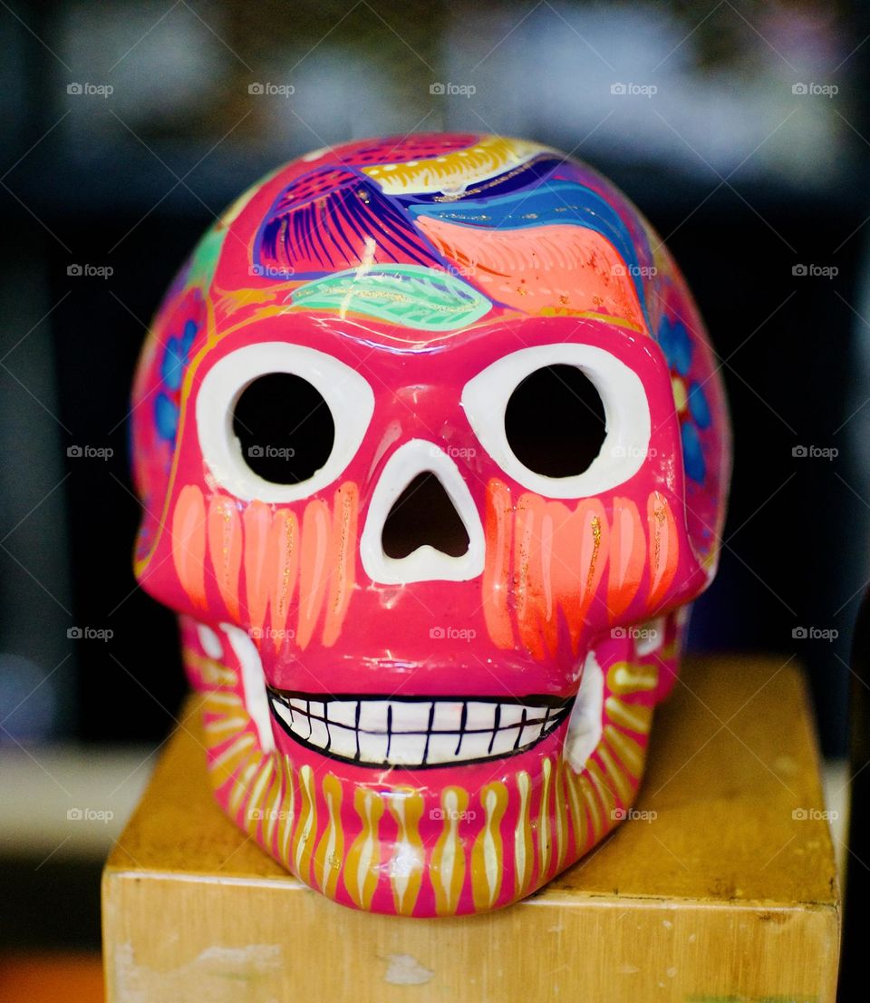 Closeup of a ceramic painted skull.