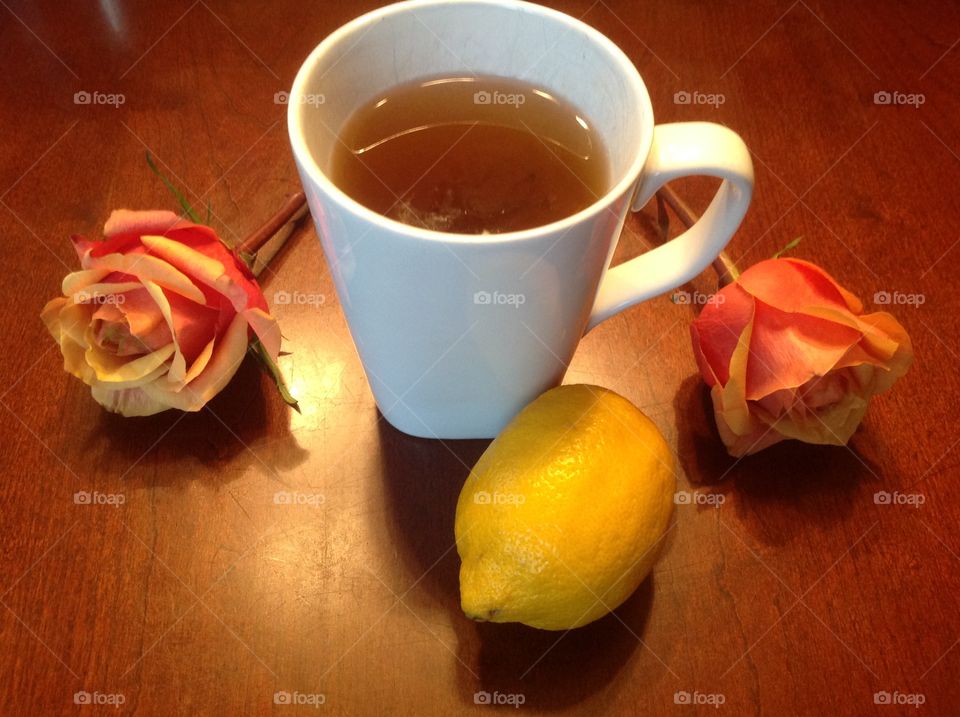 Enjoying a hot cup of tea on a rainy morning. 