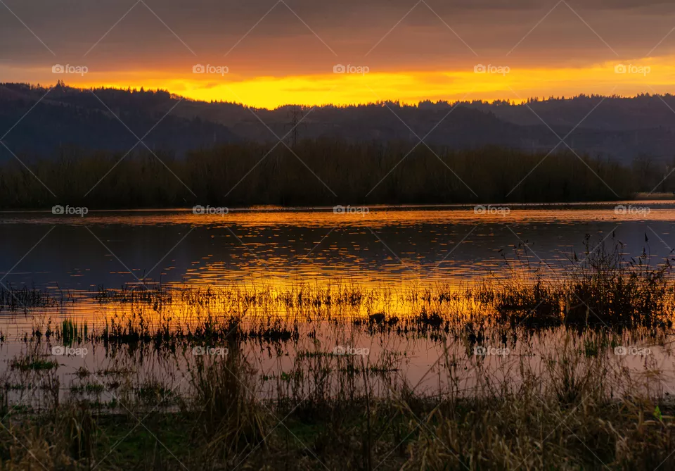 Serene sunset at Smith and Bybee lake