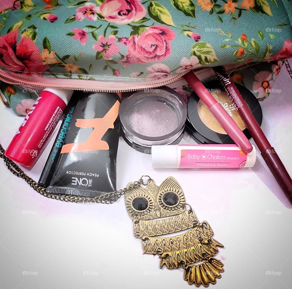 make-up pouch full of make-up products